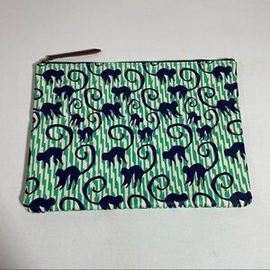 Stella & Dot monkey pouch with contrasting lining. SO CUTE